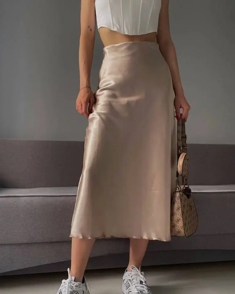 skirt outfits summer 2026 Soft satin neutrals that catch the light