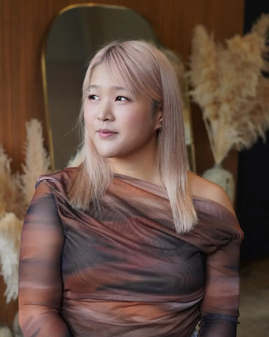 summer blonde hair color for women 2026 Muted Champagne Blonde With Natural Soft Finish