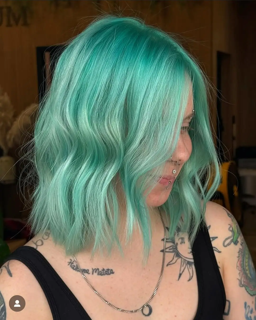 summer blonde hair color for women 2026 Cool Aqua Blonde Bob With Playful Edge