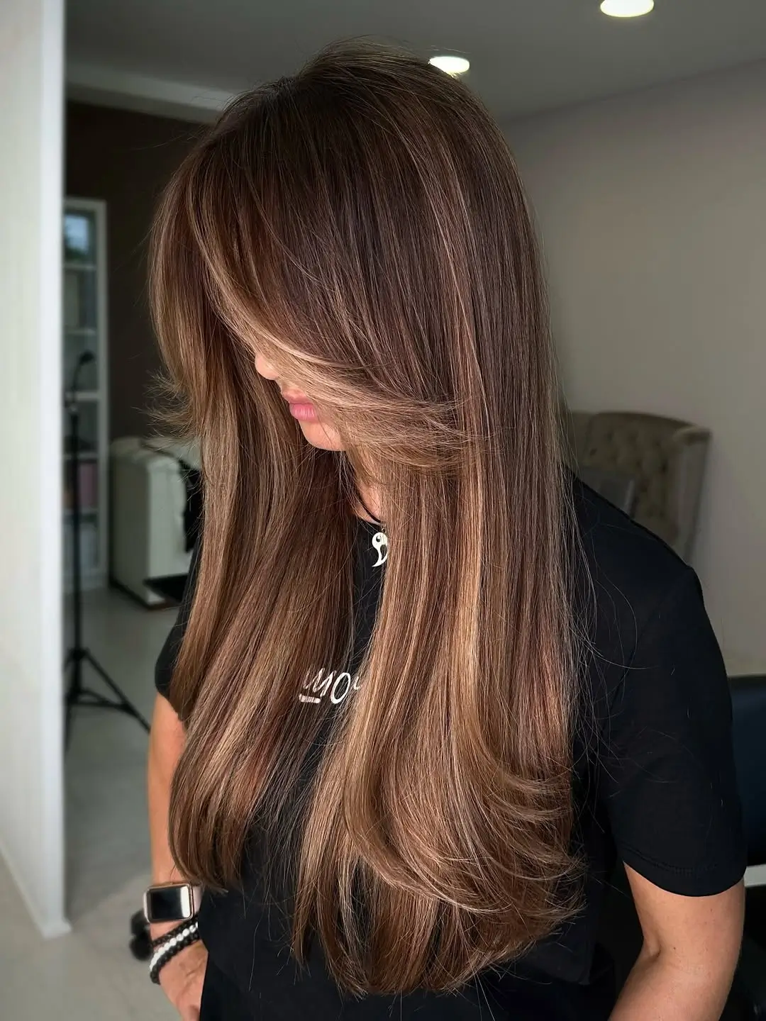 summer brunette hair color for women 2026 Layered Espresso Length with Airy Movement