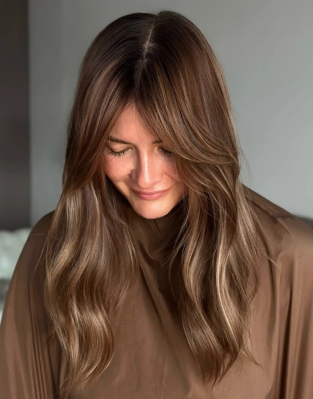 summer brunette hair color for women 2026 Warm Teddy Bear Brunette with Soft Glow