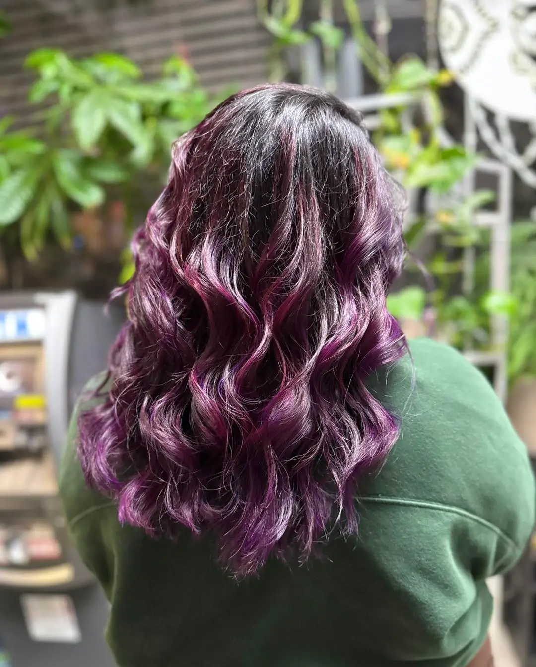 summer hair color for dark skin women 2026 Dark base with violet peekaboo waves