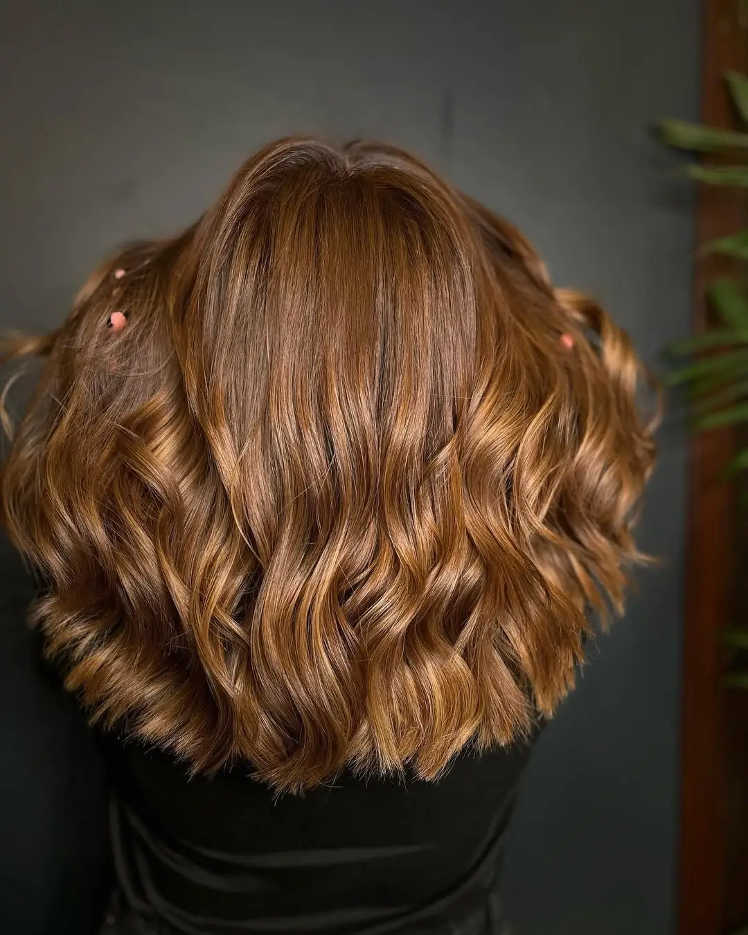 summer hair color for dark skin women 2026 Warm Caramel Waves That Catch Every Bit of Sun