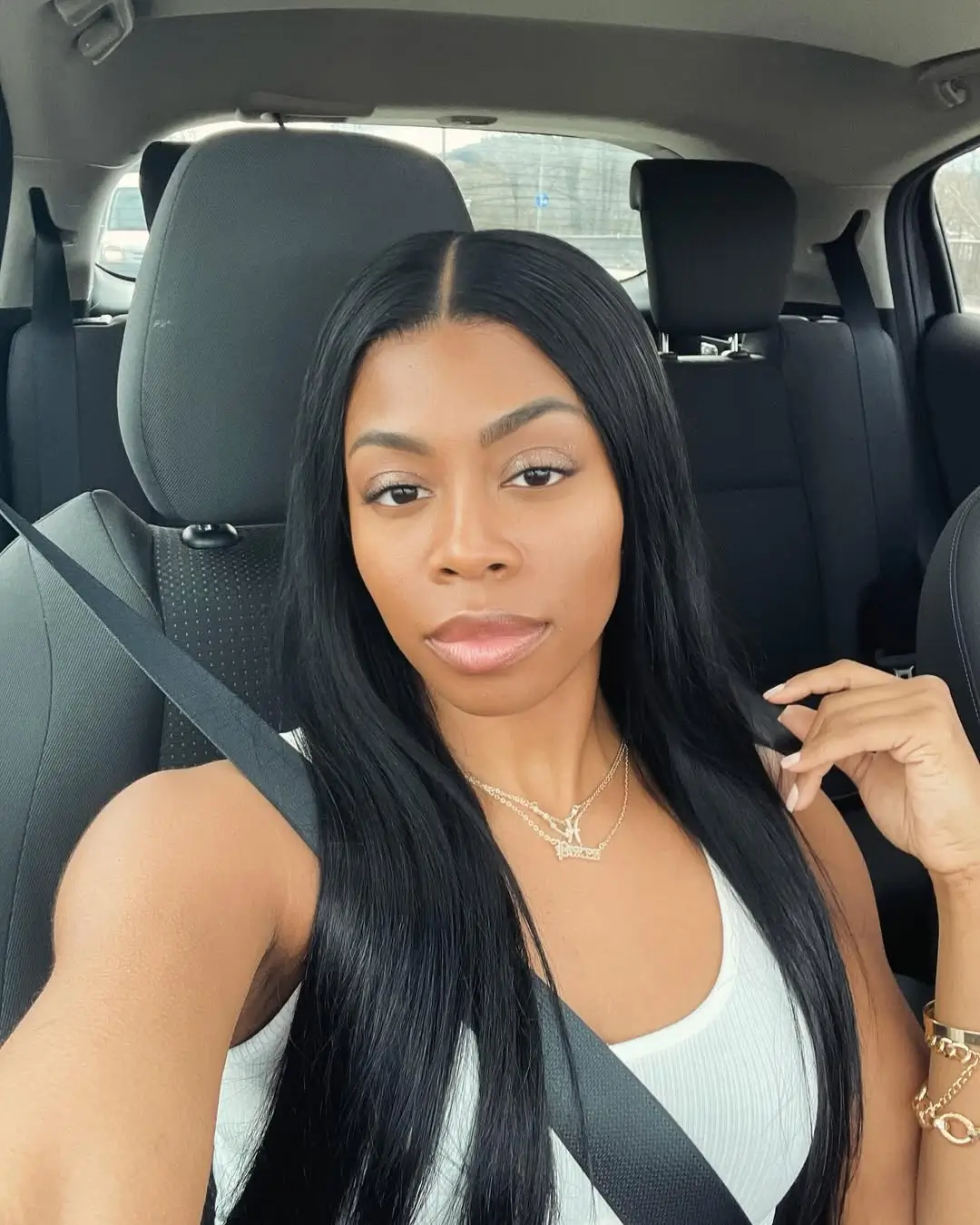 summer hair color for dark skin women 2026 Classic Jet Black Glass Hair with a Center Part