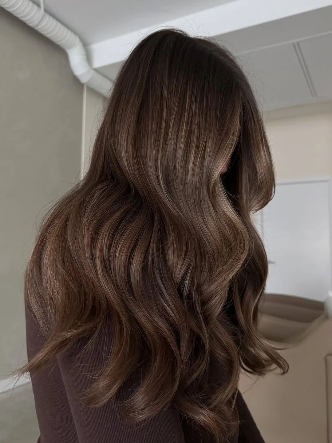 summer hair color for light skin women 2026 Deep Espresso Waves That Feel Polished but Not Heavy