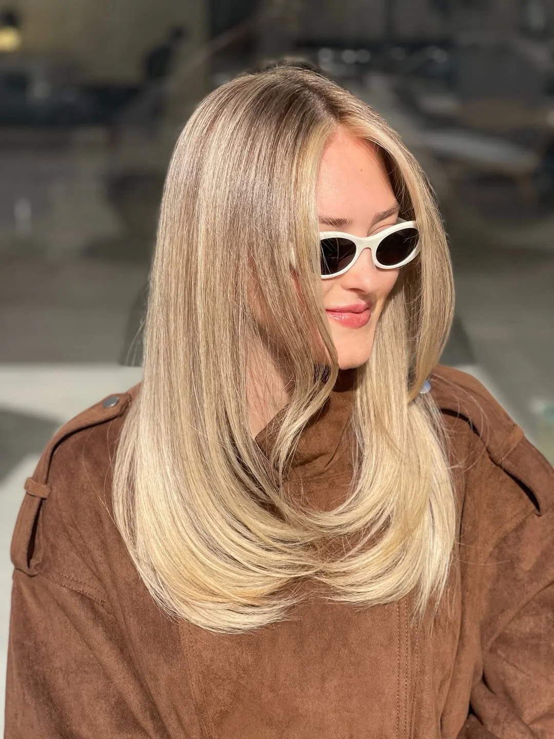 summer hair color for light skin women 2026 Cool Vanilla Blonde with a Sleek Sculpted Finish