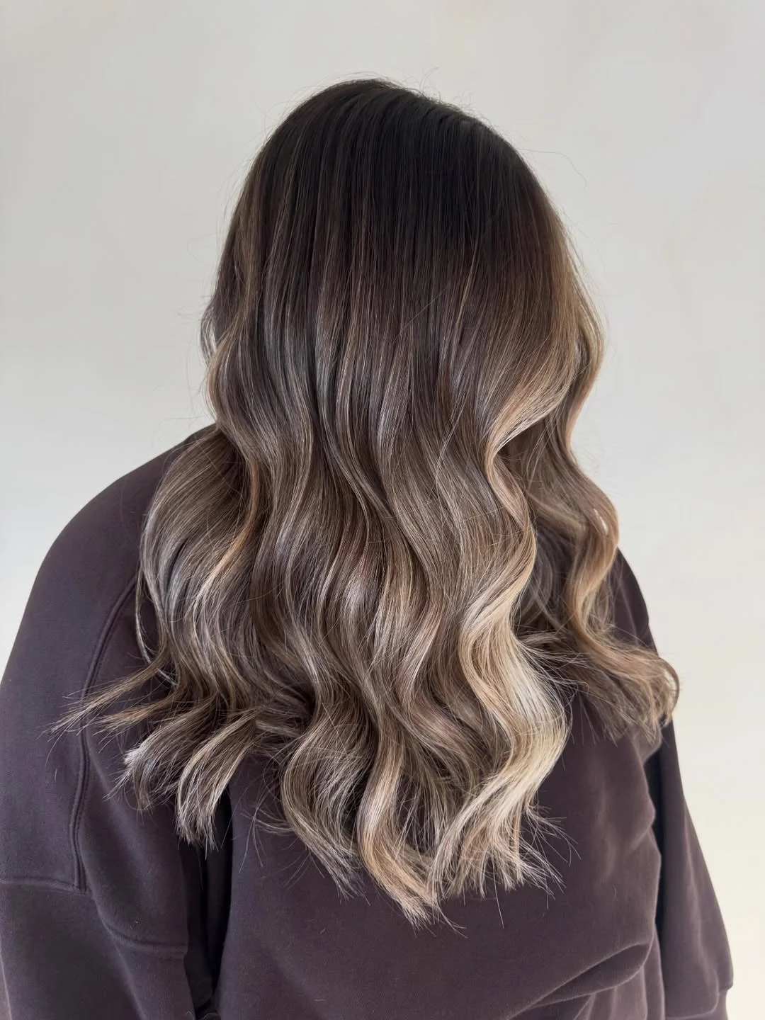 summer hair color for light skin women 2026 Dimensional Brunette with Soft Contrast Ribbons