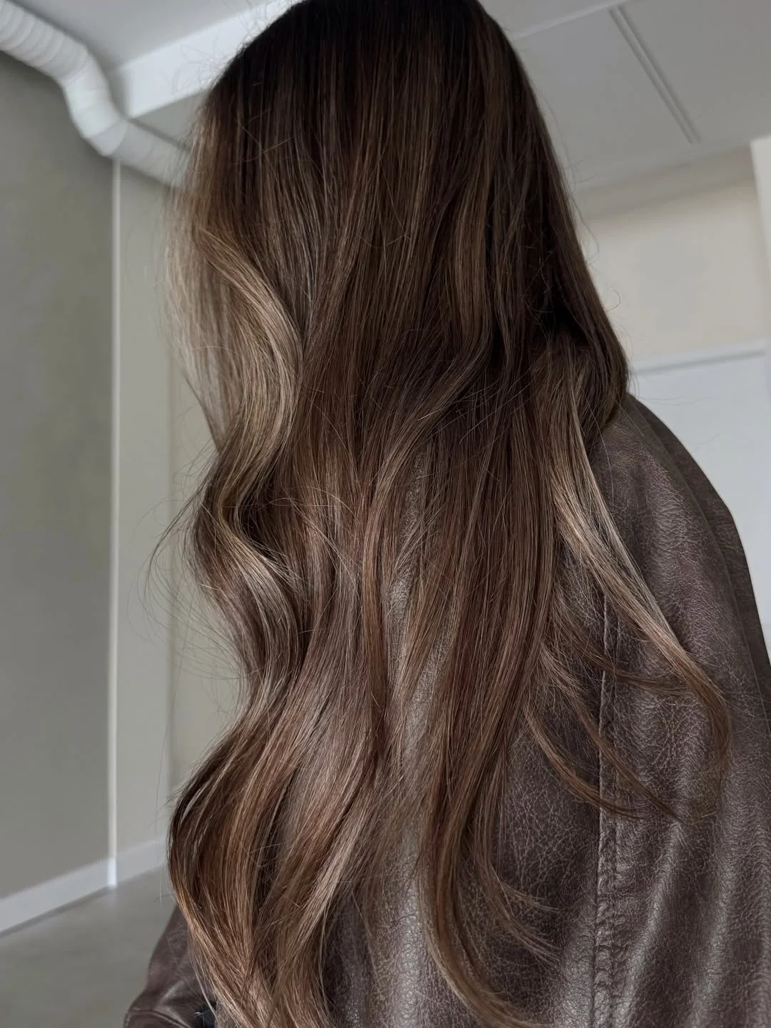 summer hair color for light skin women 2026 Deep Brunette Melt with Subtle Cool Highlights