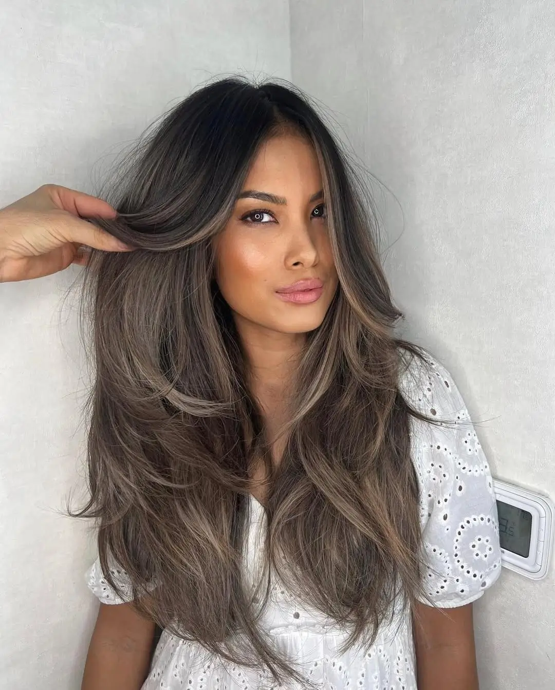 summer hair color for tan skin women 2026 Cool Ash Brown Layers with Face-Framing Light