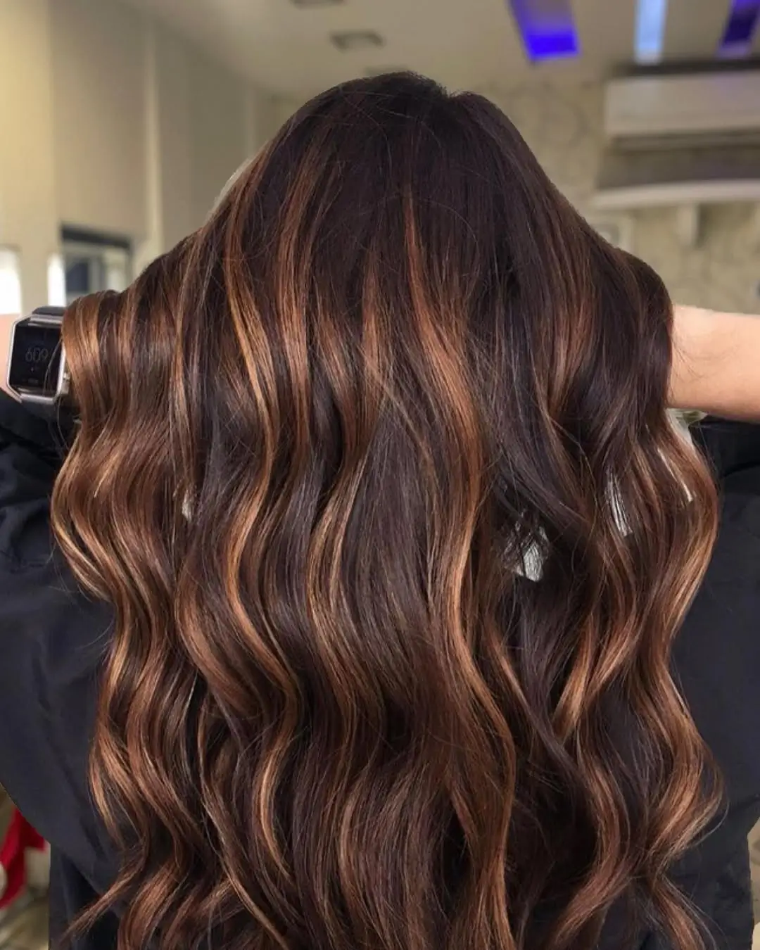 summer hair color for tan skin women 2026 Warm Copper Ribbons on Deep Brunette Base