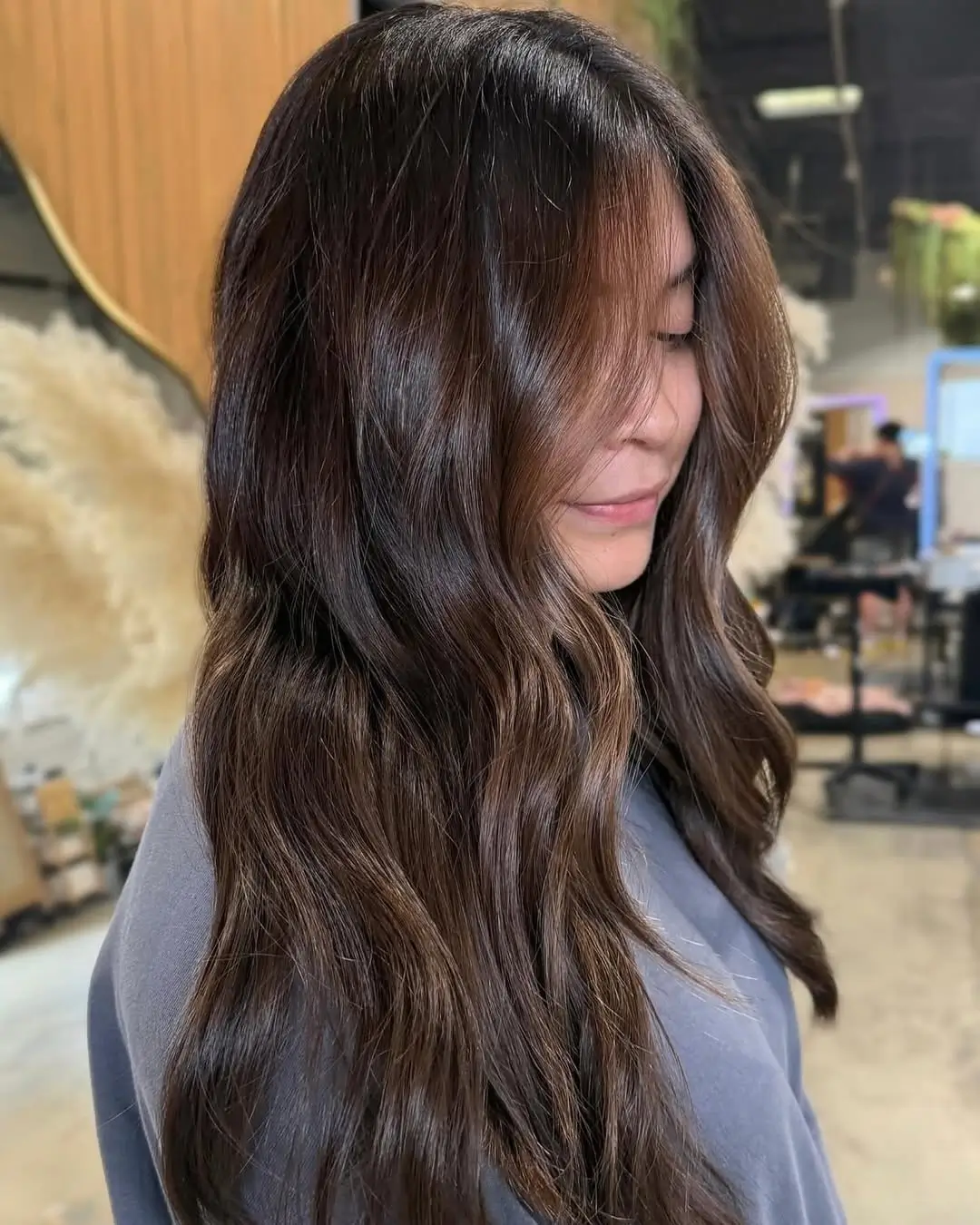 summer hair color ideas for brunette women 2026 Soft Waves with Subtle Ombre Dimension