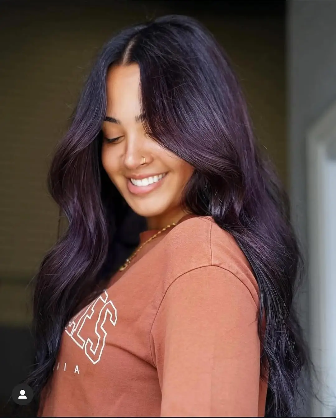 summer hair color ideas for brunette women 2026 Deep Plum Brunette with Glossy Waves