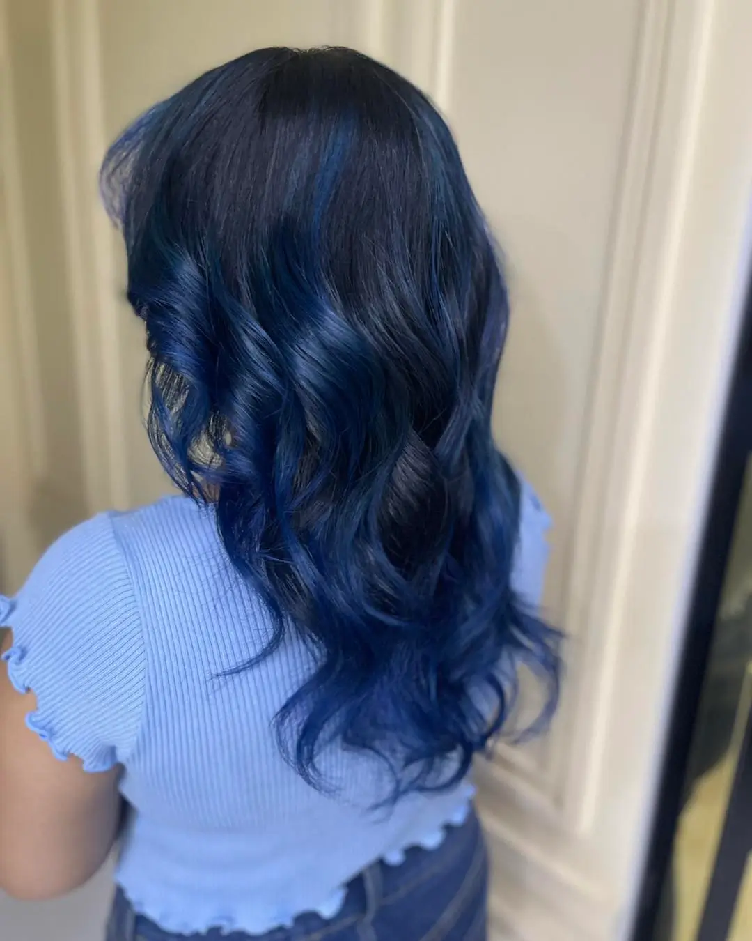 summer hair color ideas for brunette women 2026 Deep Blue Black Waves for a Vivid Summer Twist
