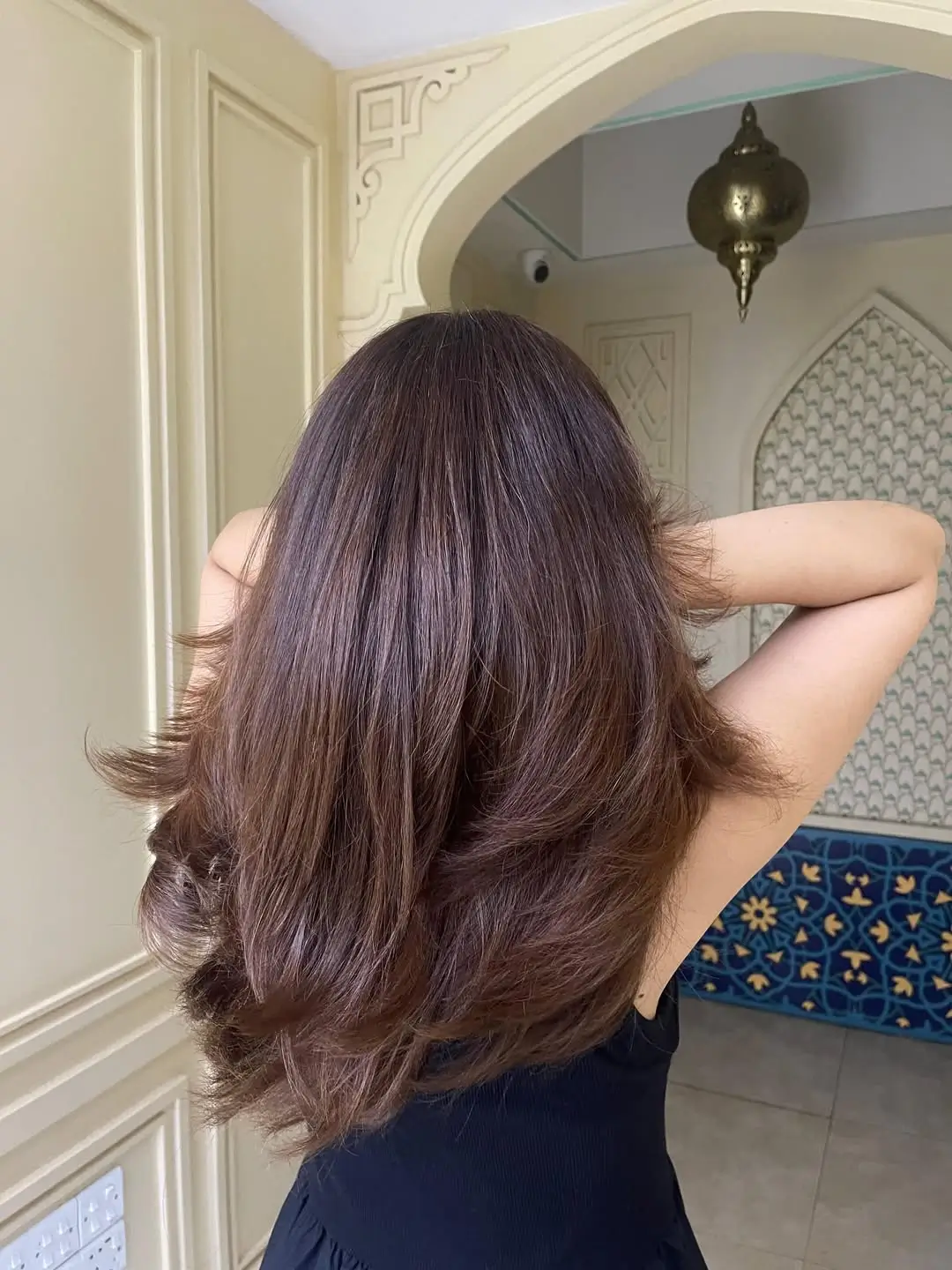 summer hair color ideas for brunette women 2026 Feathered Chocolate Layers with Natural Shine