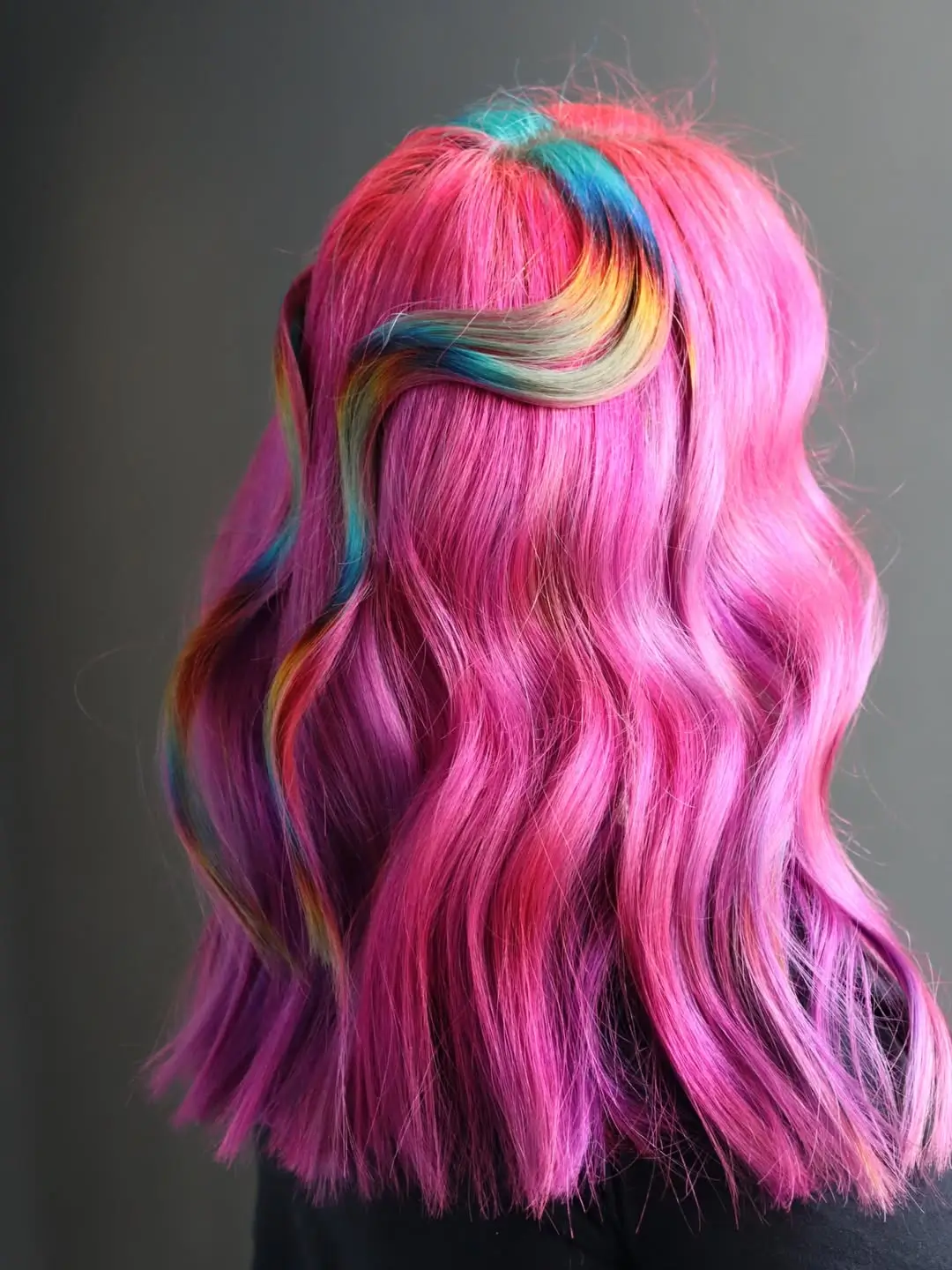 summer hair color ideas for women 2026 Electric Pink with Hidden Rainbow Flow