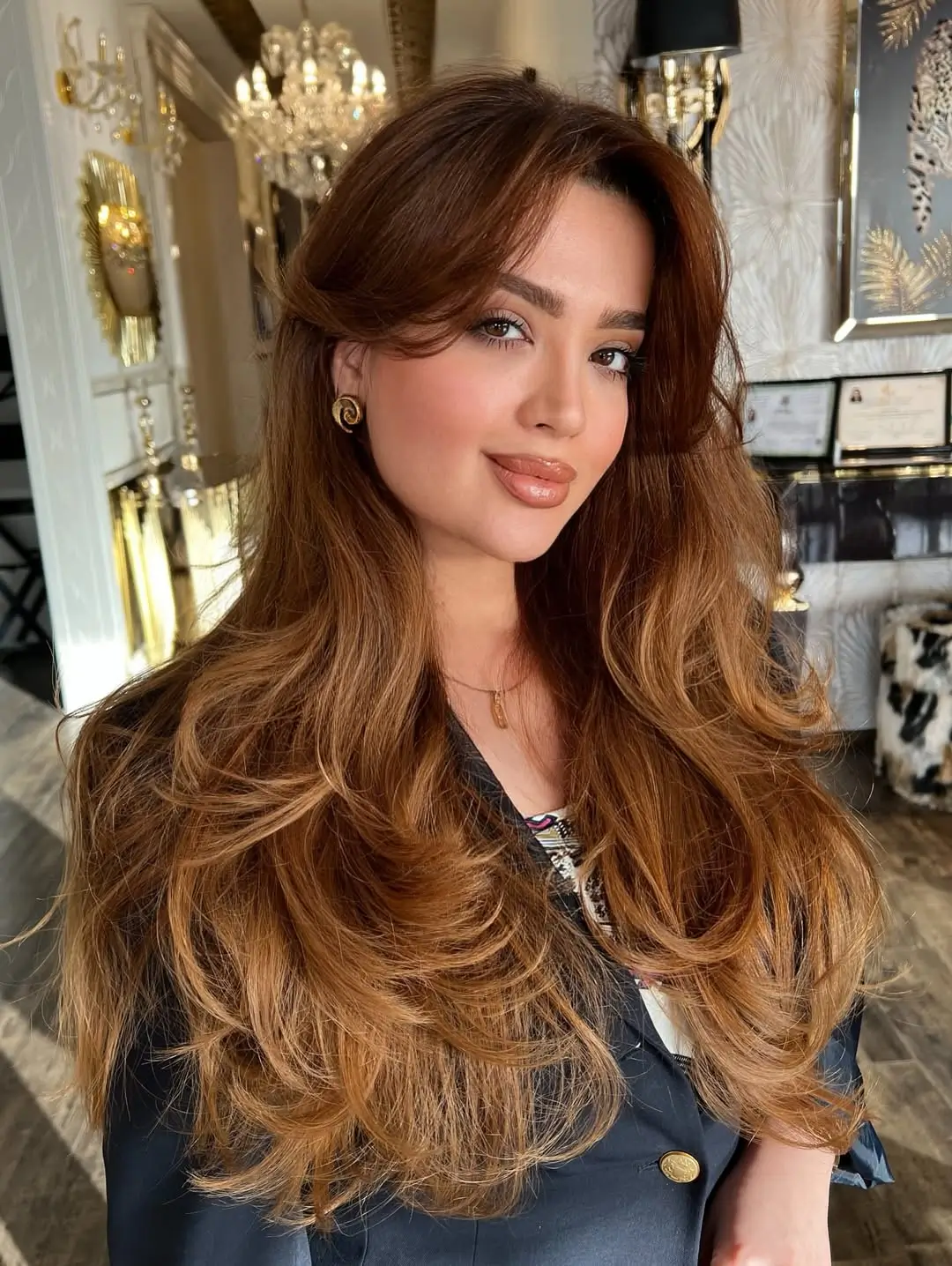 summer hair color ideas for women 2026 Warm Cinnamon Volume with Face-Framing Lift