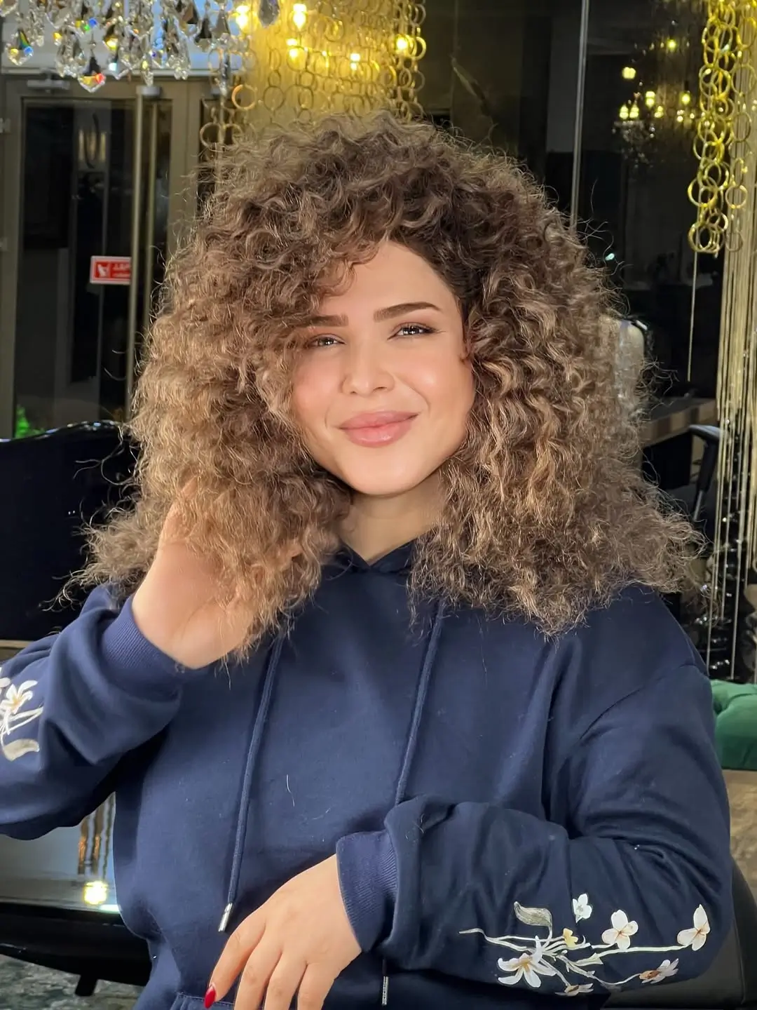 summer hair color ideas for women 2026 Defined Curly Dimension with Honey Highlights