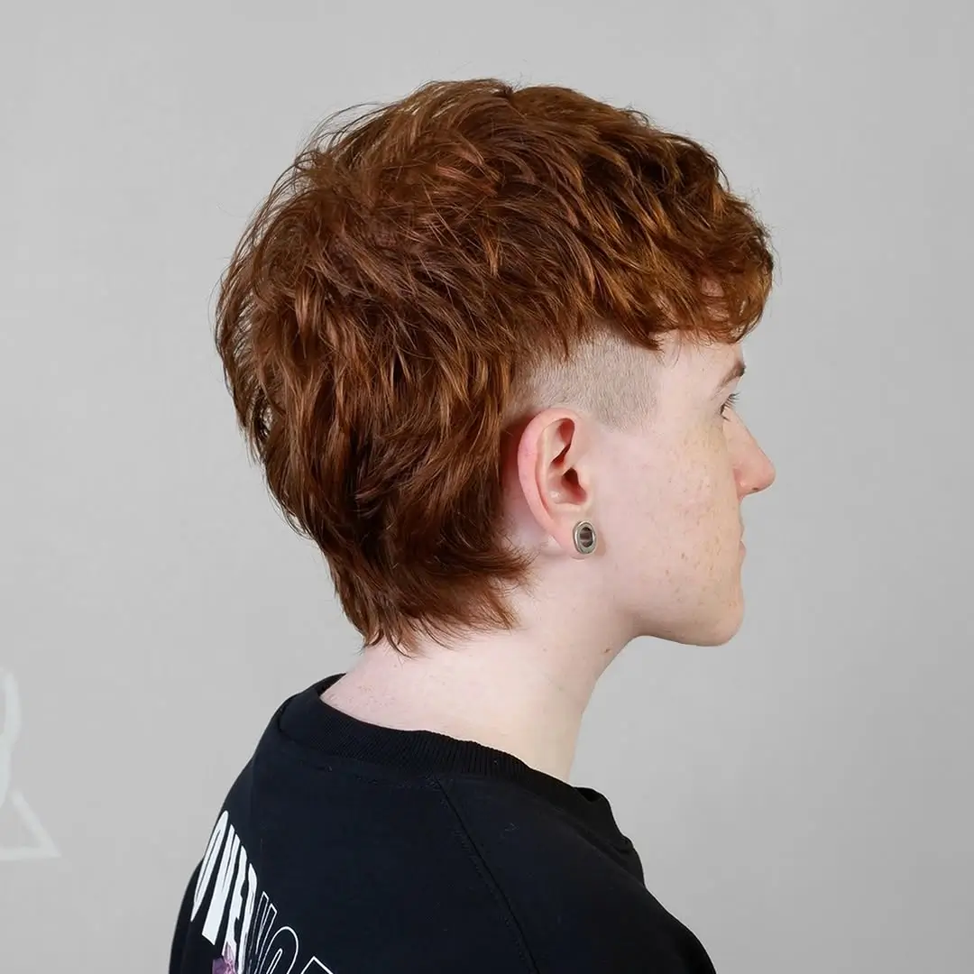 summer haircuts for boys 2026 Soft Ginger Mullet with Tapered Sides