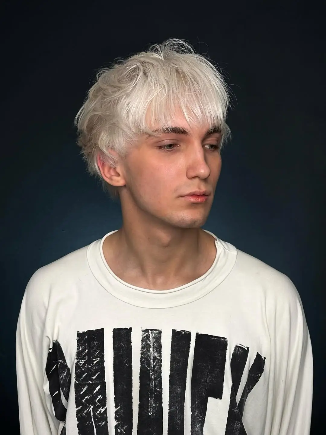 summer haircuts for boys 2026 Soft Platinum Shag with Airy Texture