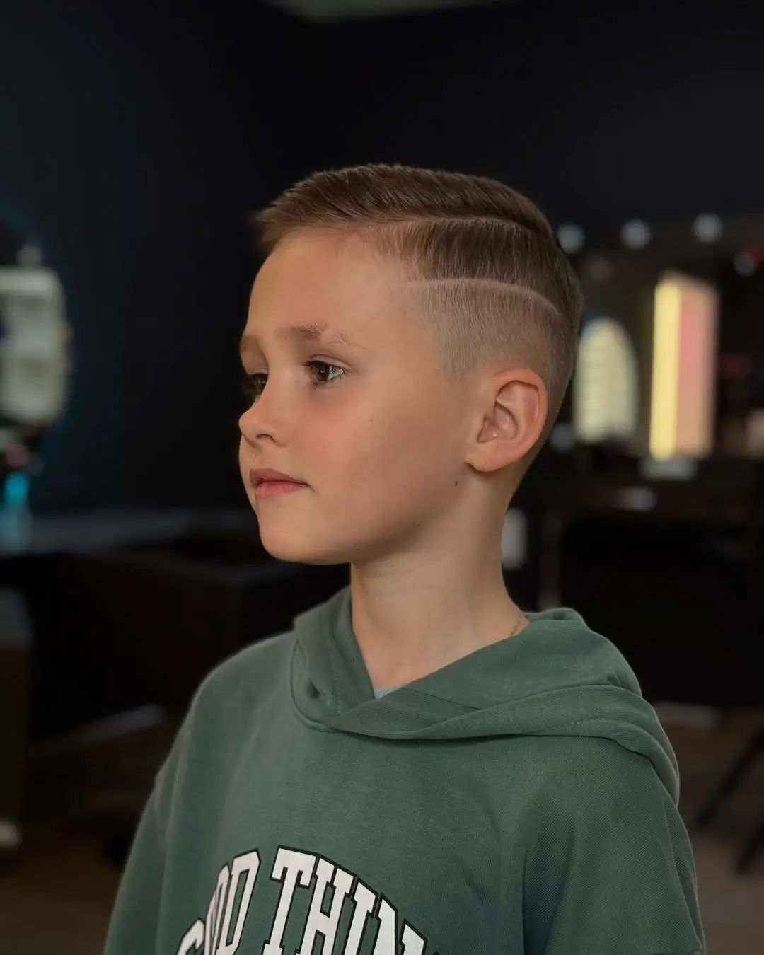 summer haircuts for boys 2026 Sharp Side Part with Graphic Line Detail