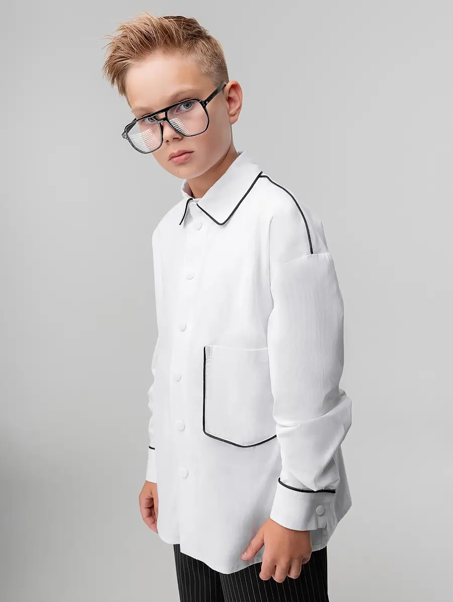 summer haircuts for boys 2026 Sharp Side-Swept Undercut with Volume