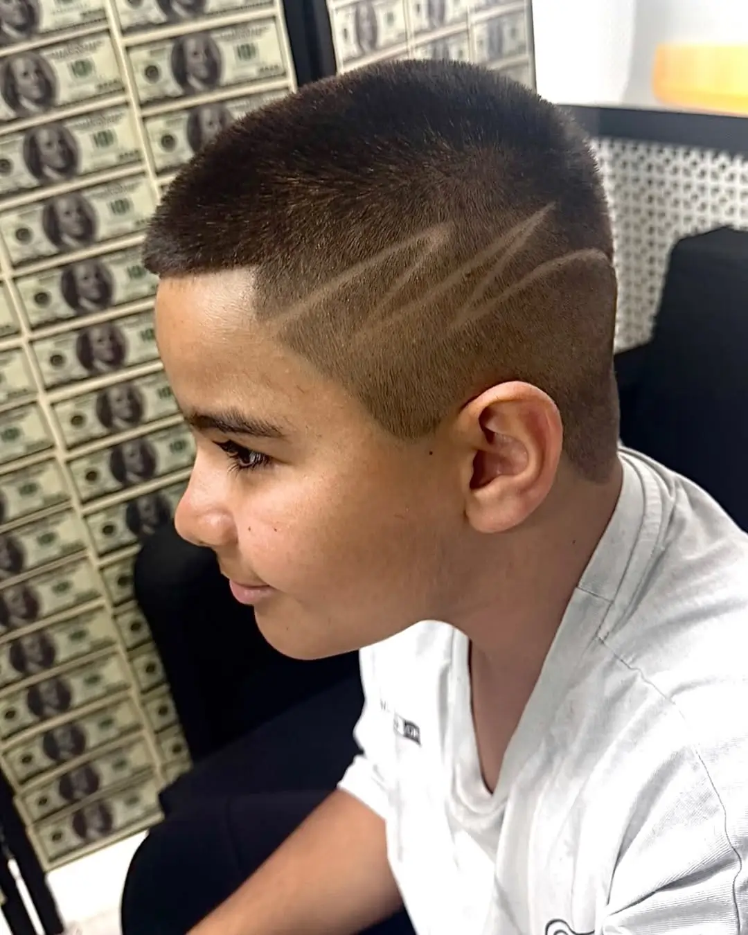 summer haircuts for boys 2026 Textured Buzz with Subtle Design Lines