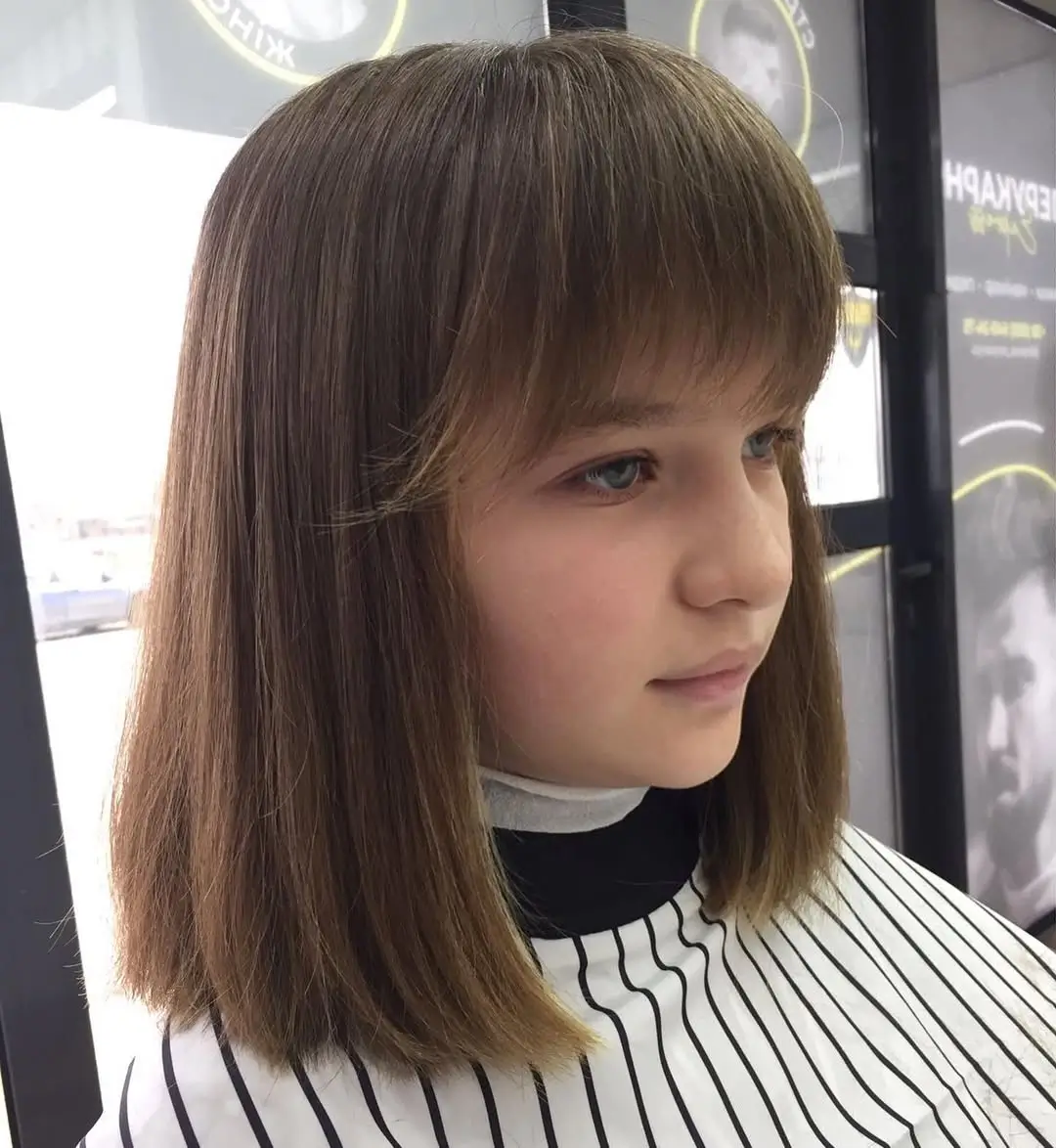 summer haircuts for girls 2026 Blunt Cut with Soft Fringe for a Youthful Finish