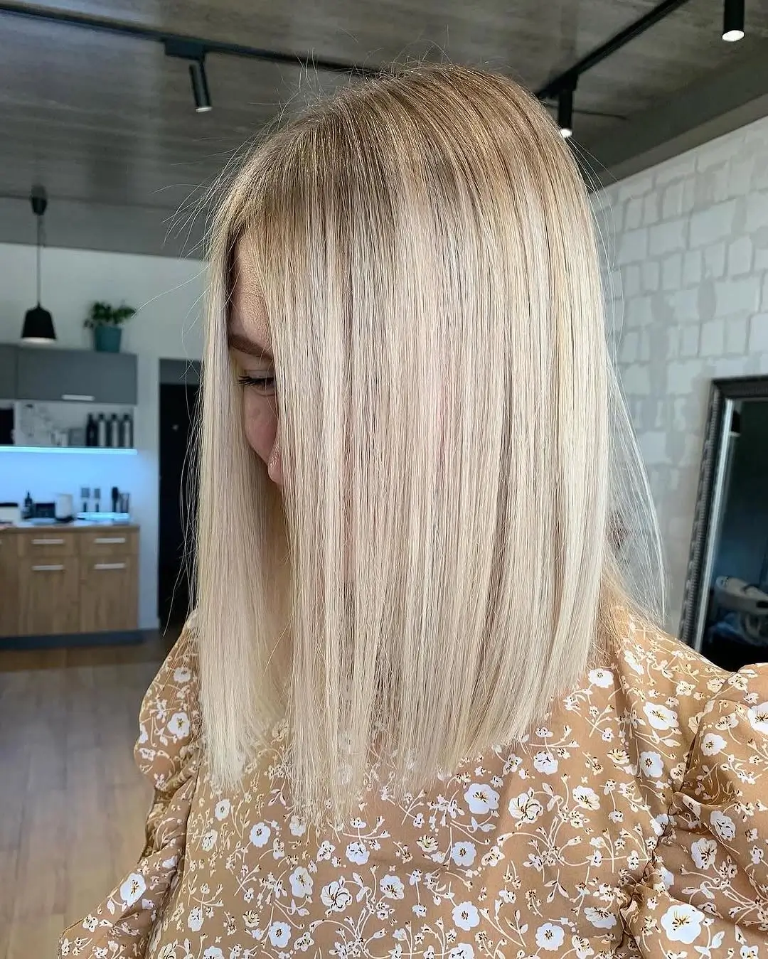 summer haircuts for girls 2026 Sleek Blunt Blonde Lob