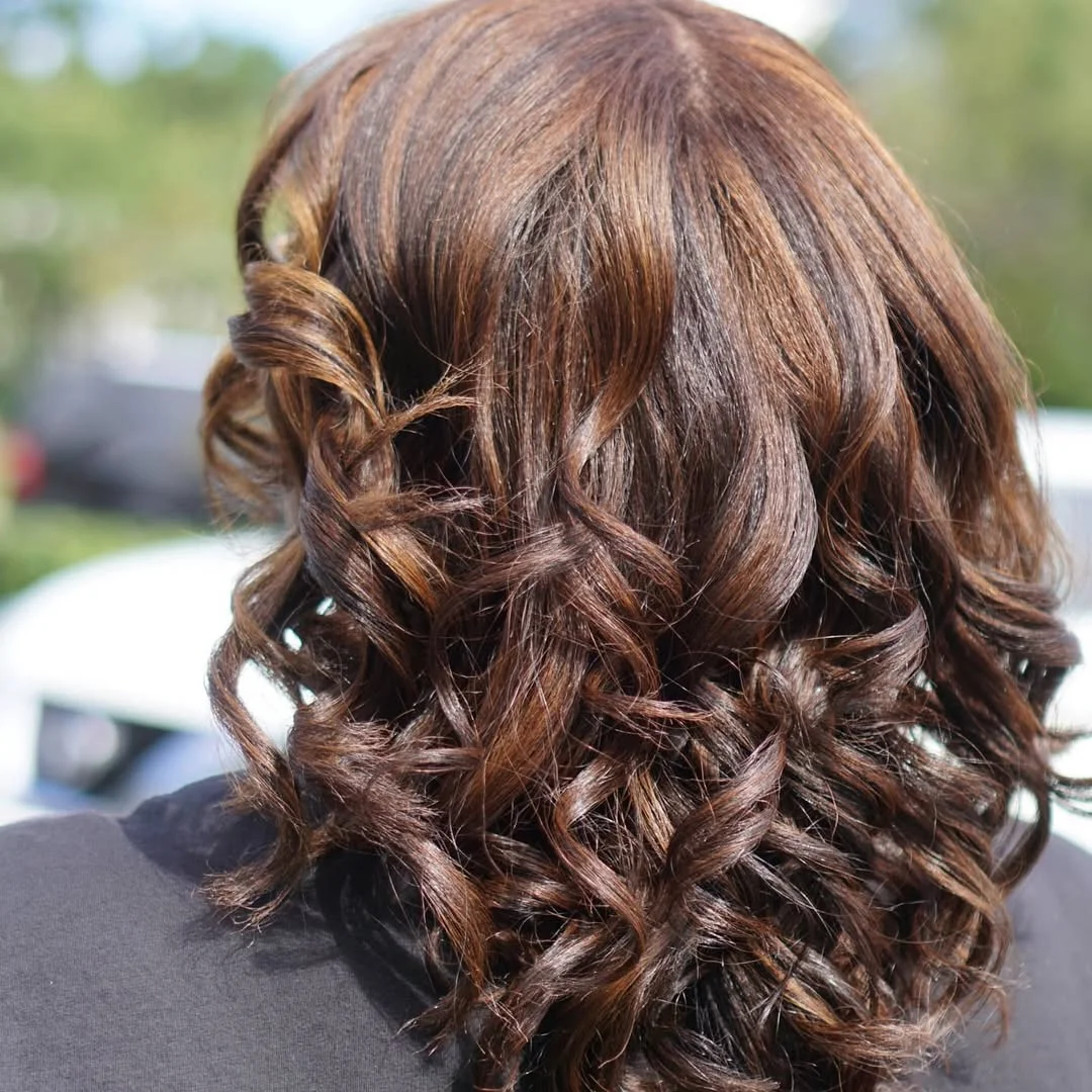 summer hairstyles for black women 2026 Sunlit Chocolate Curls with Effortless Movement