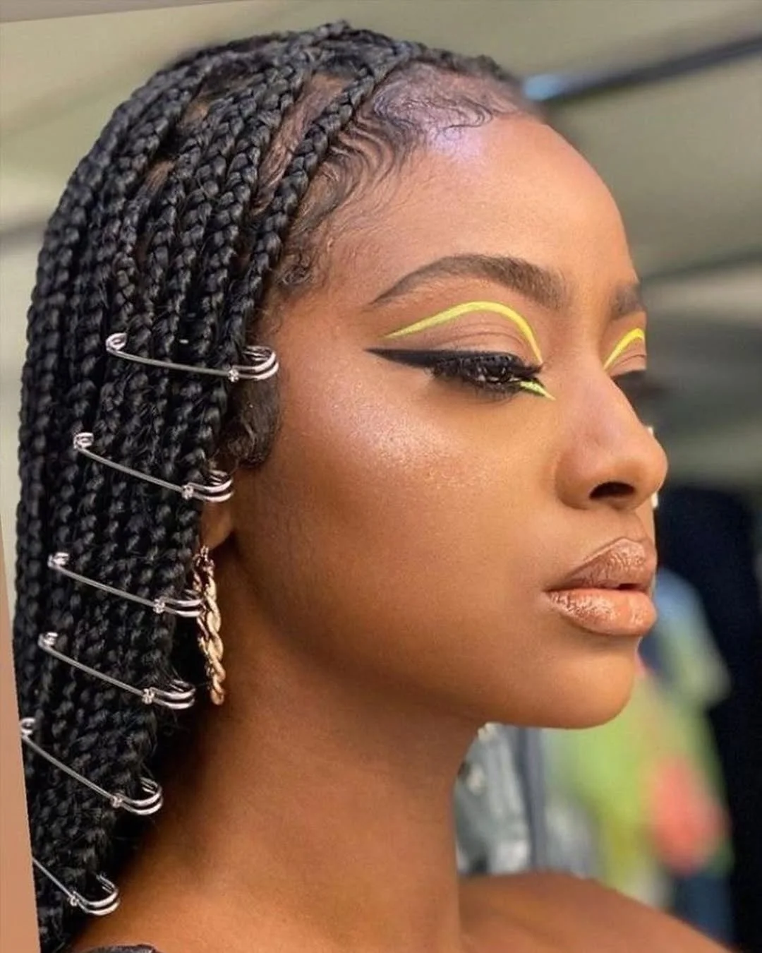 summer hairstyles for black women 2026 Statement Braids with Edgy Details