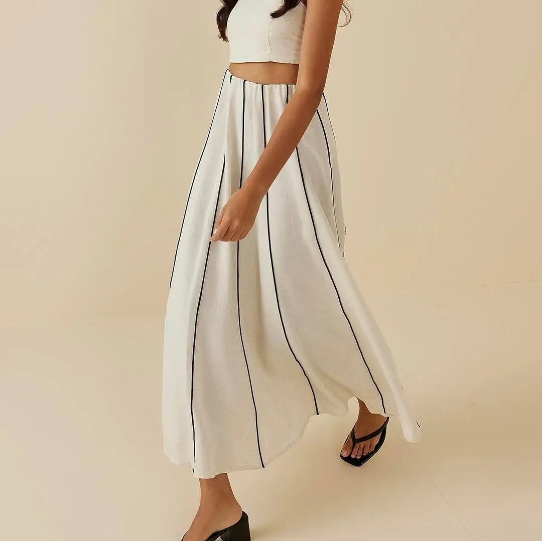 summer linen skirt outfits 2026 Beige Midi with Movement - Understated but Never Boring