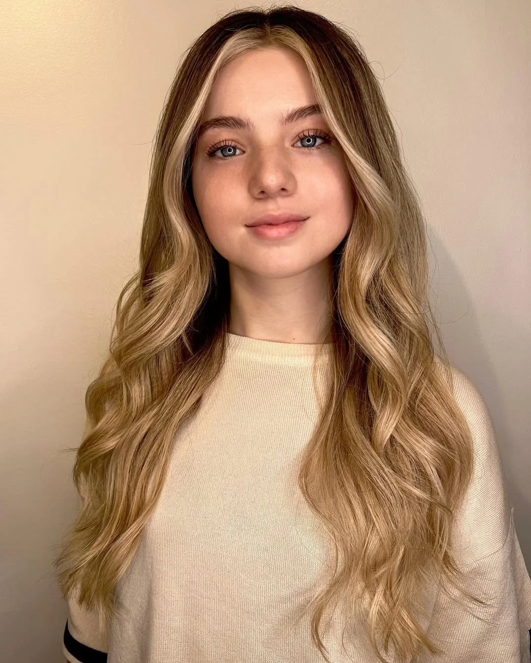 summer money piece hair color for women 2026 Classic Miel Blonde with a Soft Halo Effect