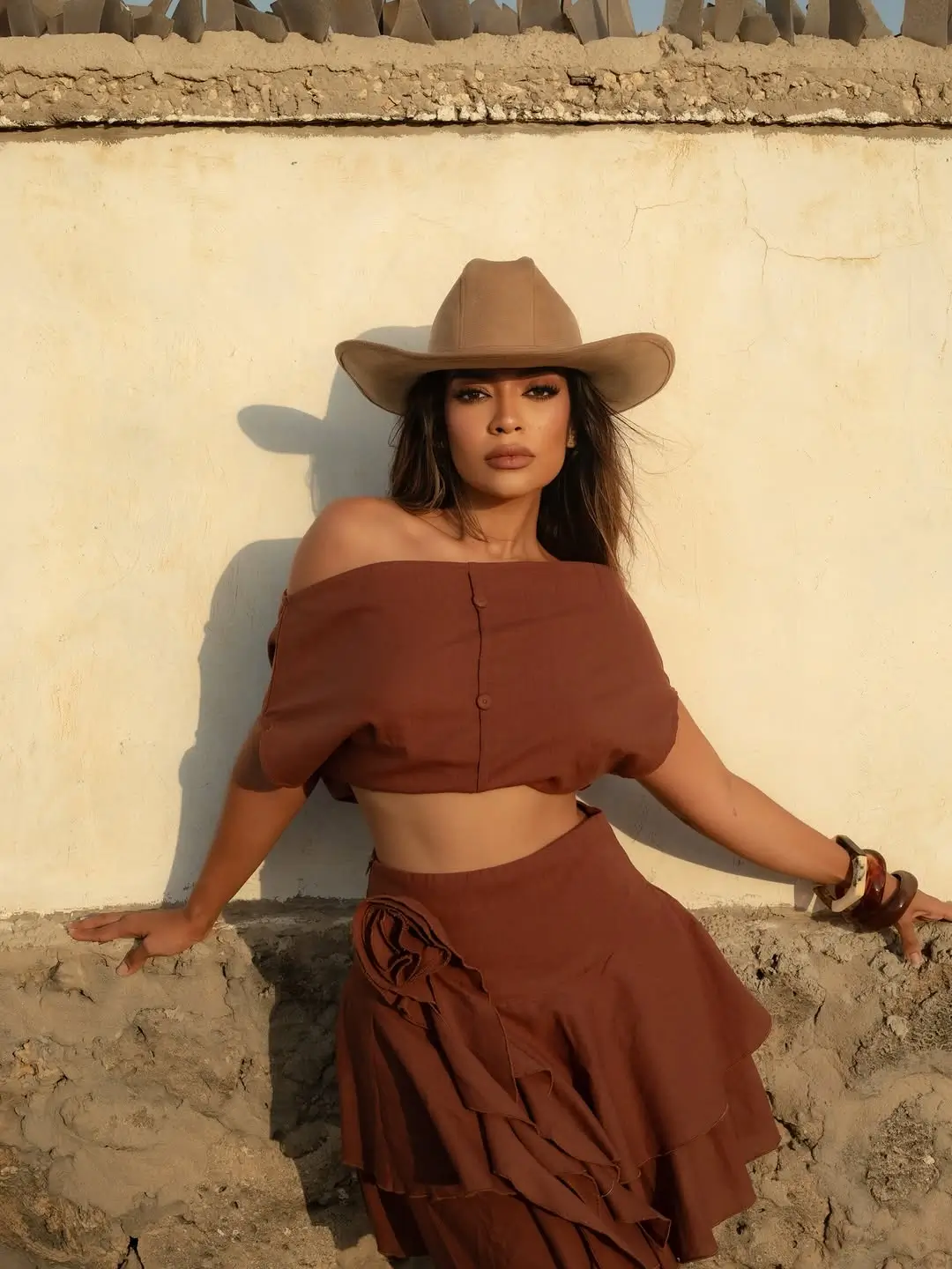 summer outfits 2026 Sunset desert tones with feminine structure