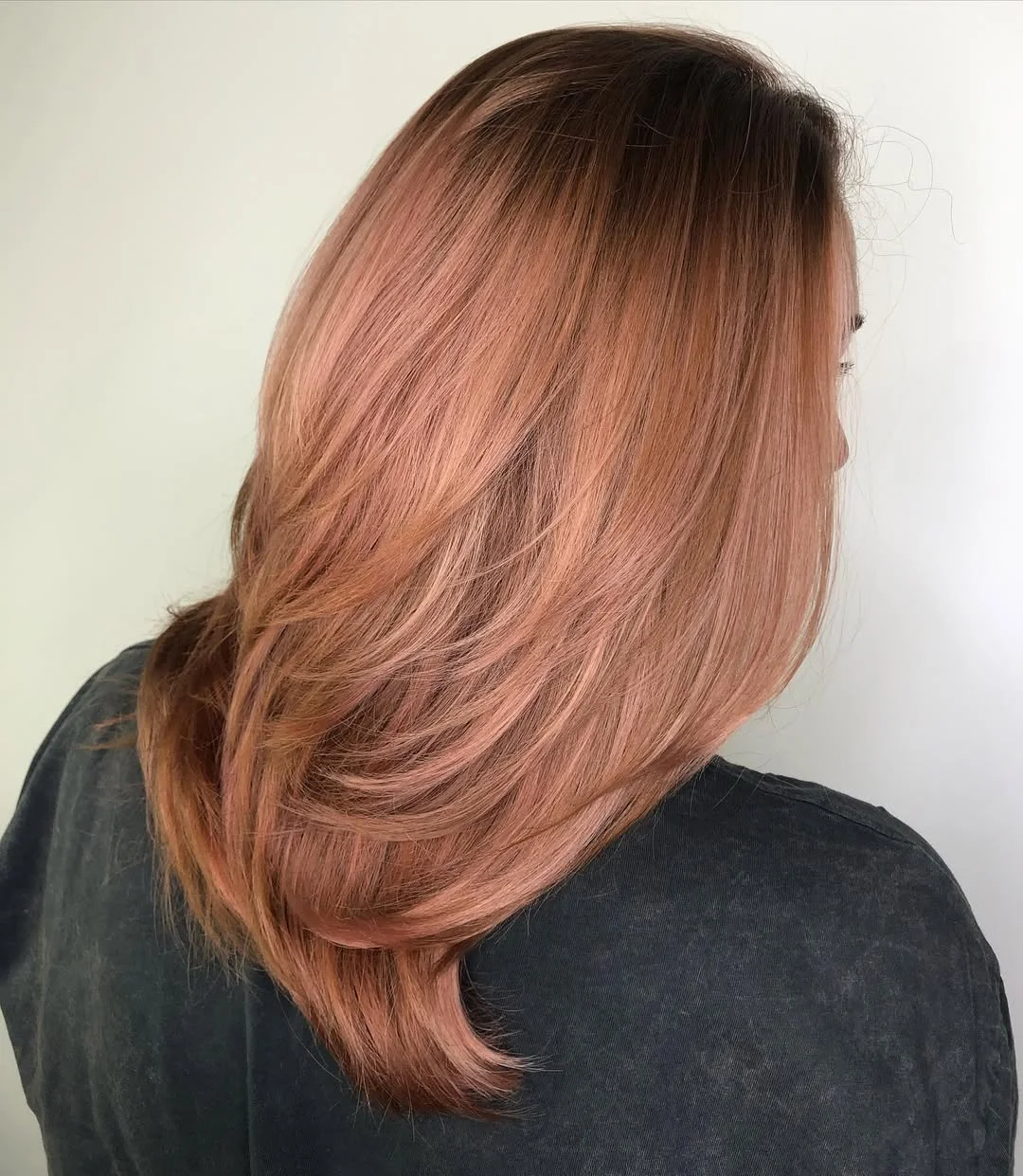summer strawberry blonde hair color for women 2026 Layered Strawberry Copper with Natural Movement