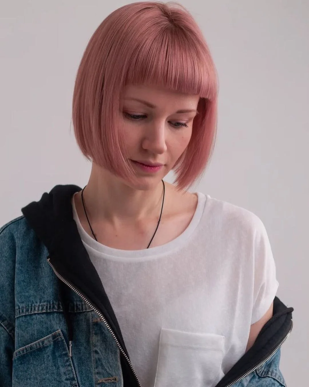 summer strawberry blonde hair color for women 2026 Minimal Pink Bob with a Clean Graphic Edge