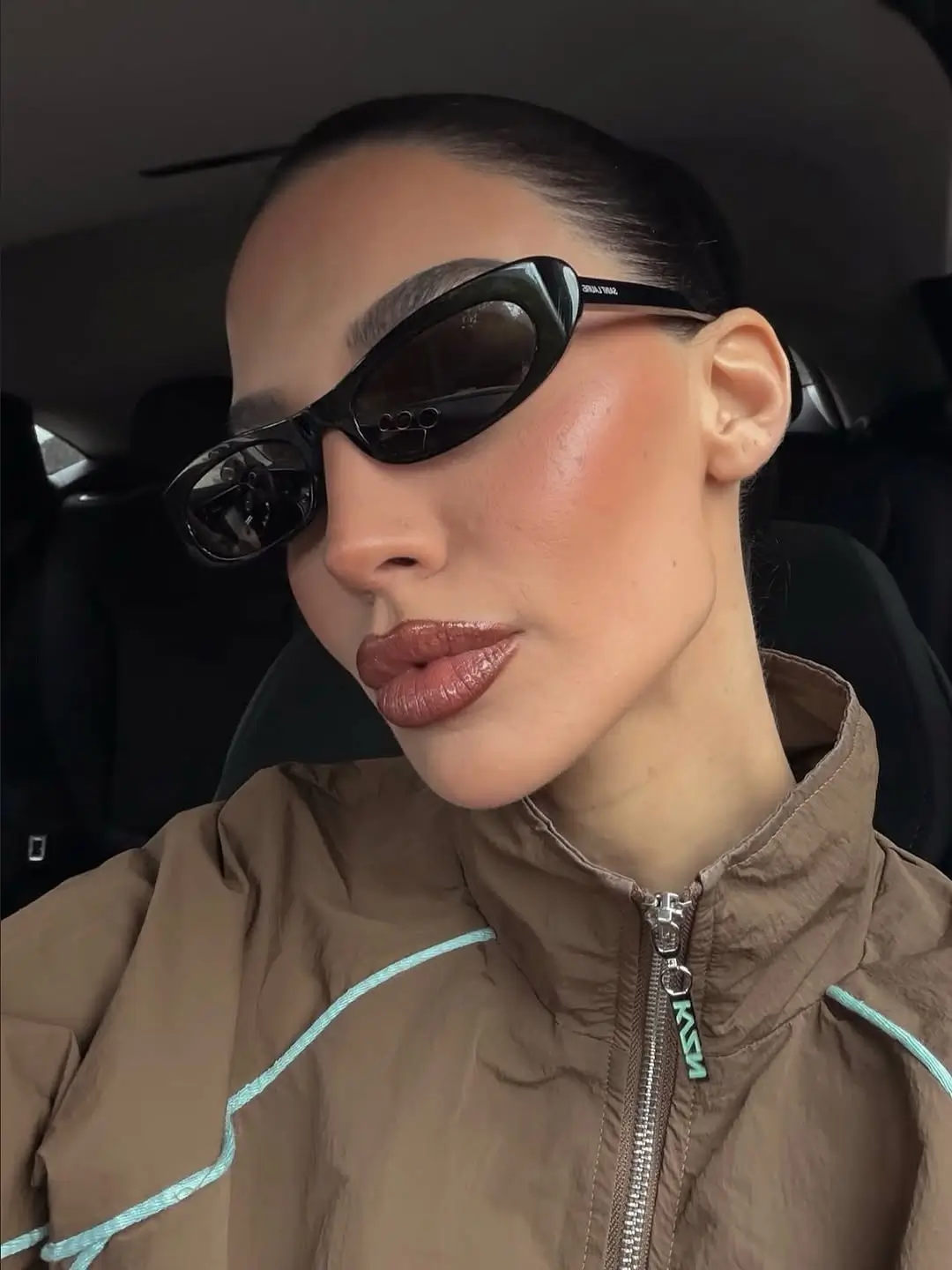 summer sunglasses for women 2026 Sleek Black Wrap Frames with Modern Edge