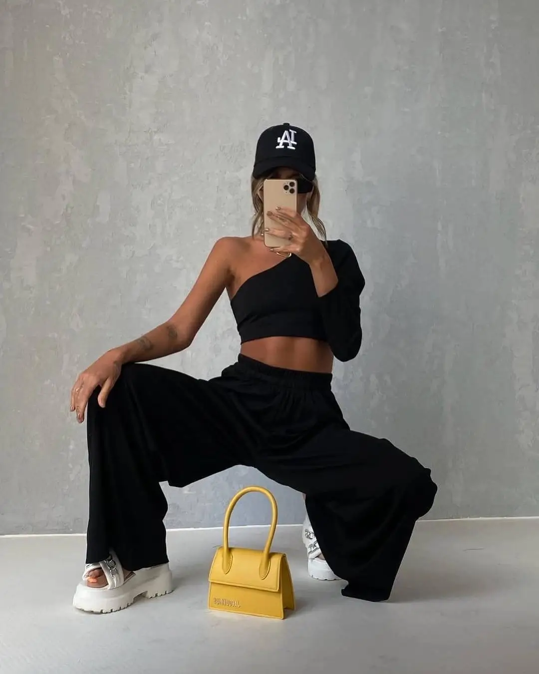 summer tops outfit 2026 One-Shoulder Black Ease with a Pop of Yellow