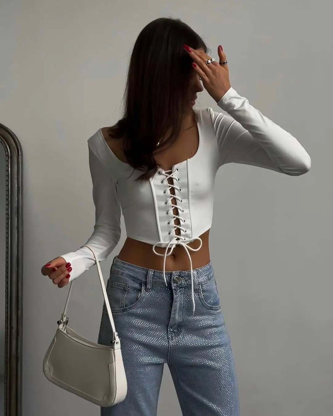 summer tops outfit 2026 White Lace-Up Top and Light Blue Denim Energy