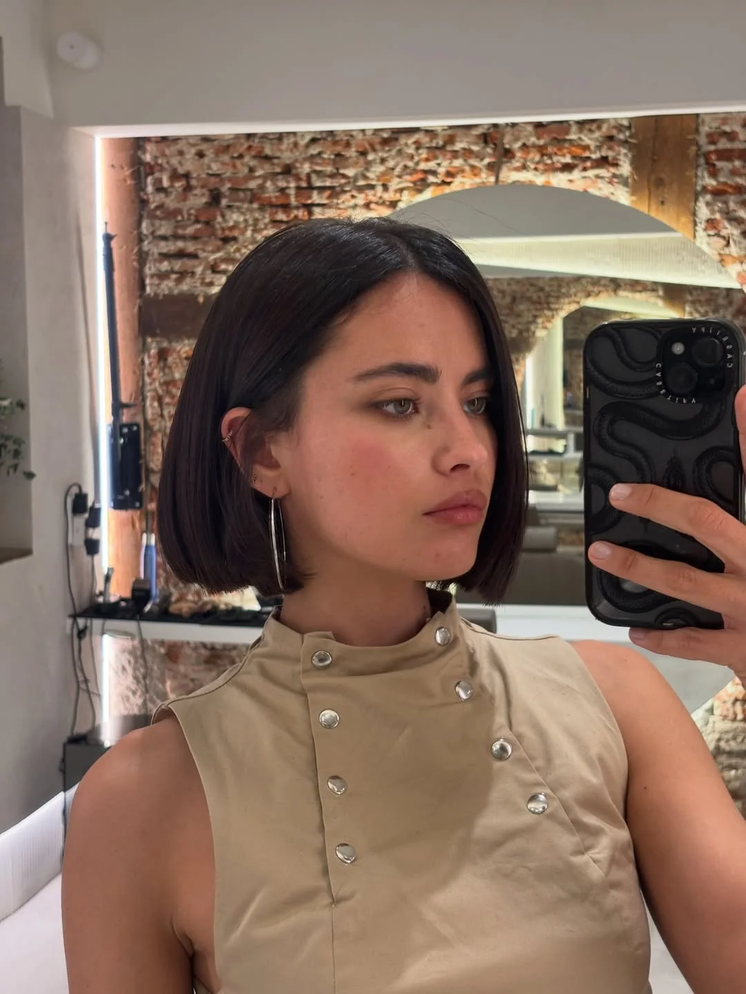 textured summer bob haircut 2026 The Sleek Dark Angled Bob - Quiet Luxury Energy