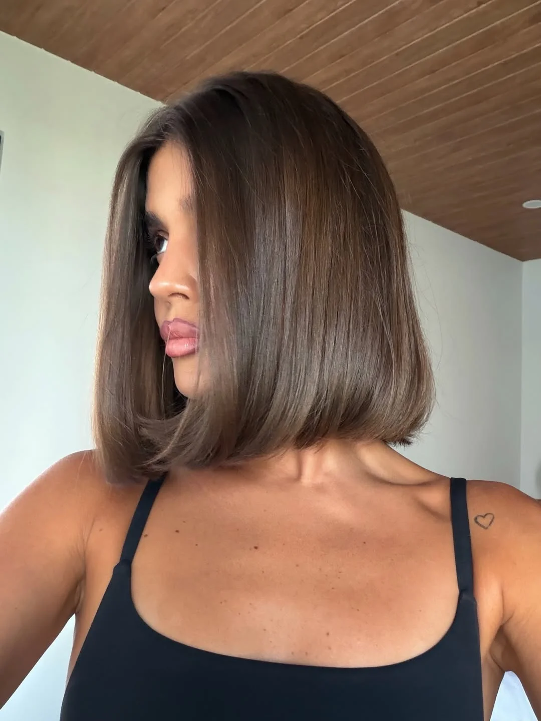 trendy summer haircut 2026 Polished Glass Bob That Feels Like a Reset