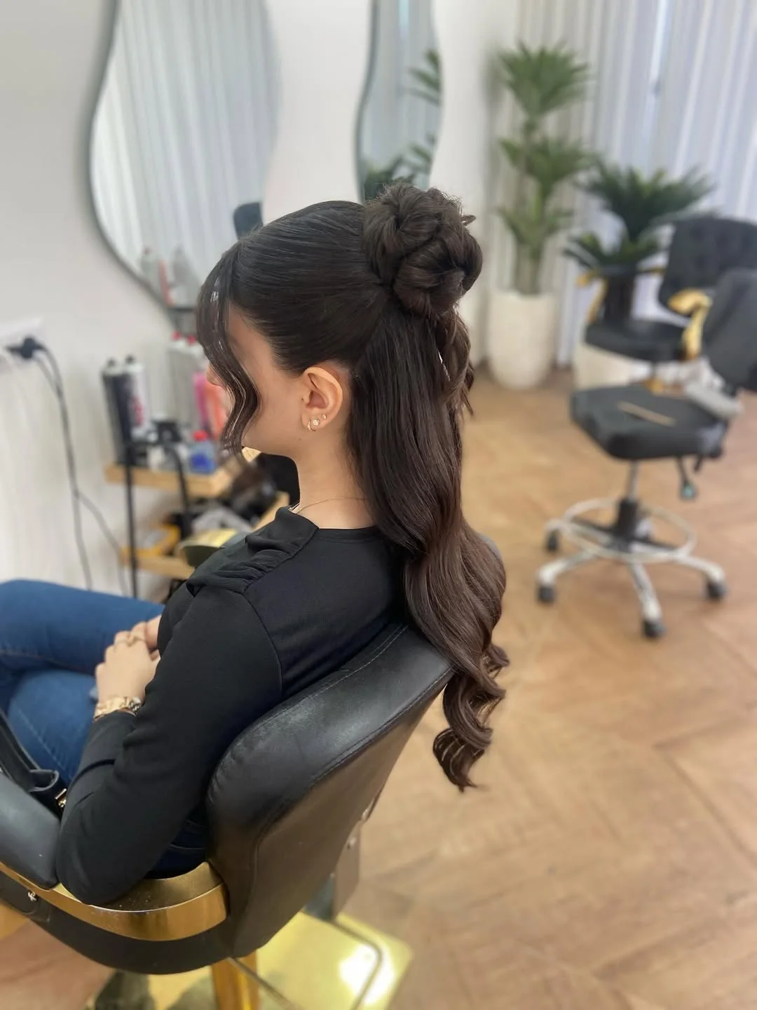beachy summer wavy hairstyle 2026 Modern Low Twist Updo with Beachy Lengths