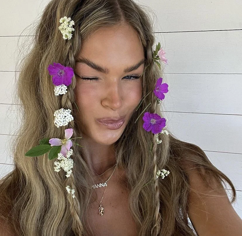 boho summer braids hairstyle 2026 Boho Floral Accent Braids with Festival Energy