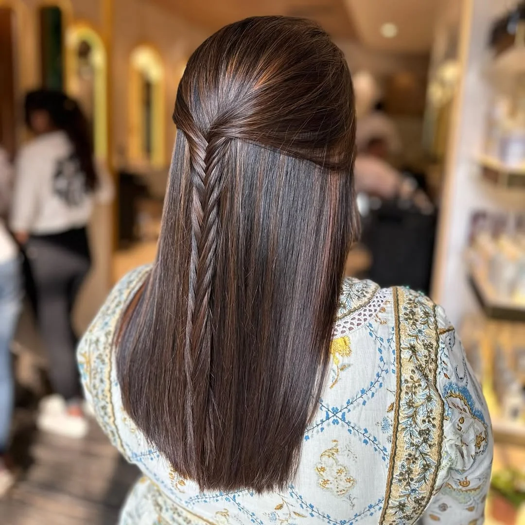 boho summer braids hairstyle 2026 Sleek Half-Up Twist with Minimalist Braided Detail