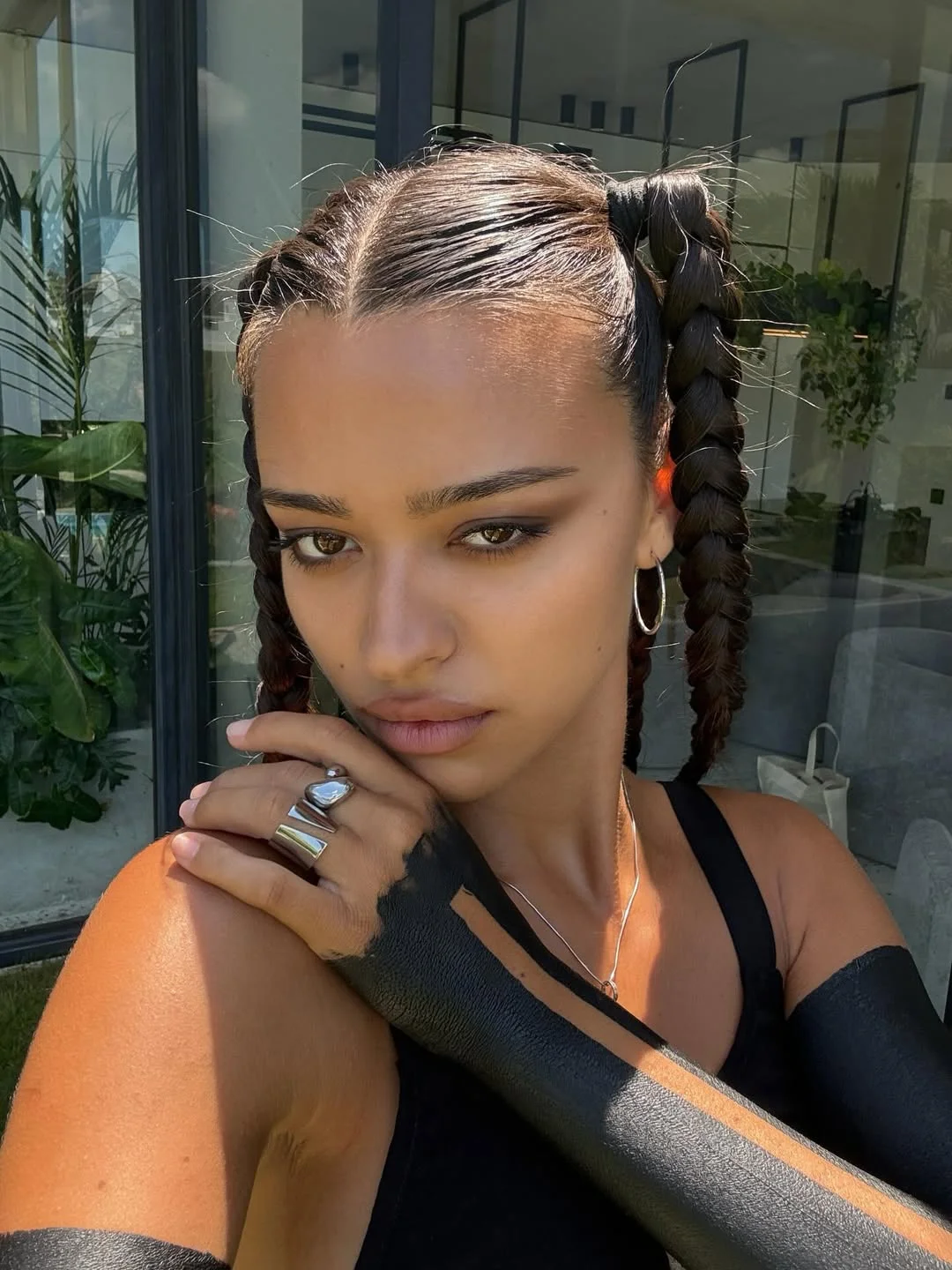 boho summer braids hairstyle 2026 Clean double braids with sleek summer energy