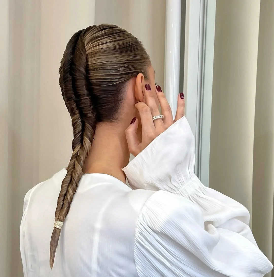 boho summer braids hairstyle 2026 Sleek twisted braid pony with modern polish