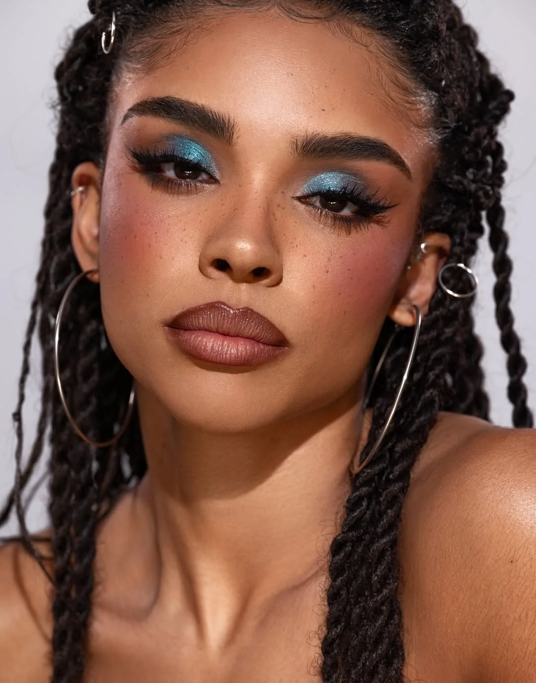 boho summer braids hairstyle 2026 Classic Boho Braids with Statement Makeup Energy