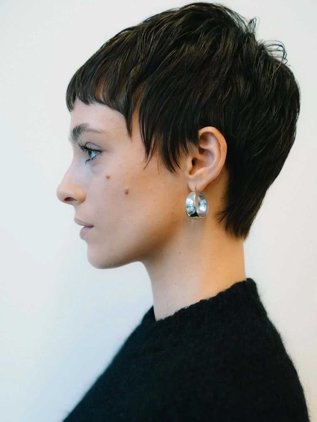 bold summer pixie haircuts 2026 Sculpted Wet-Look Pixie with Micro Bangs