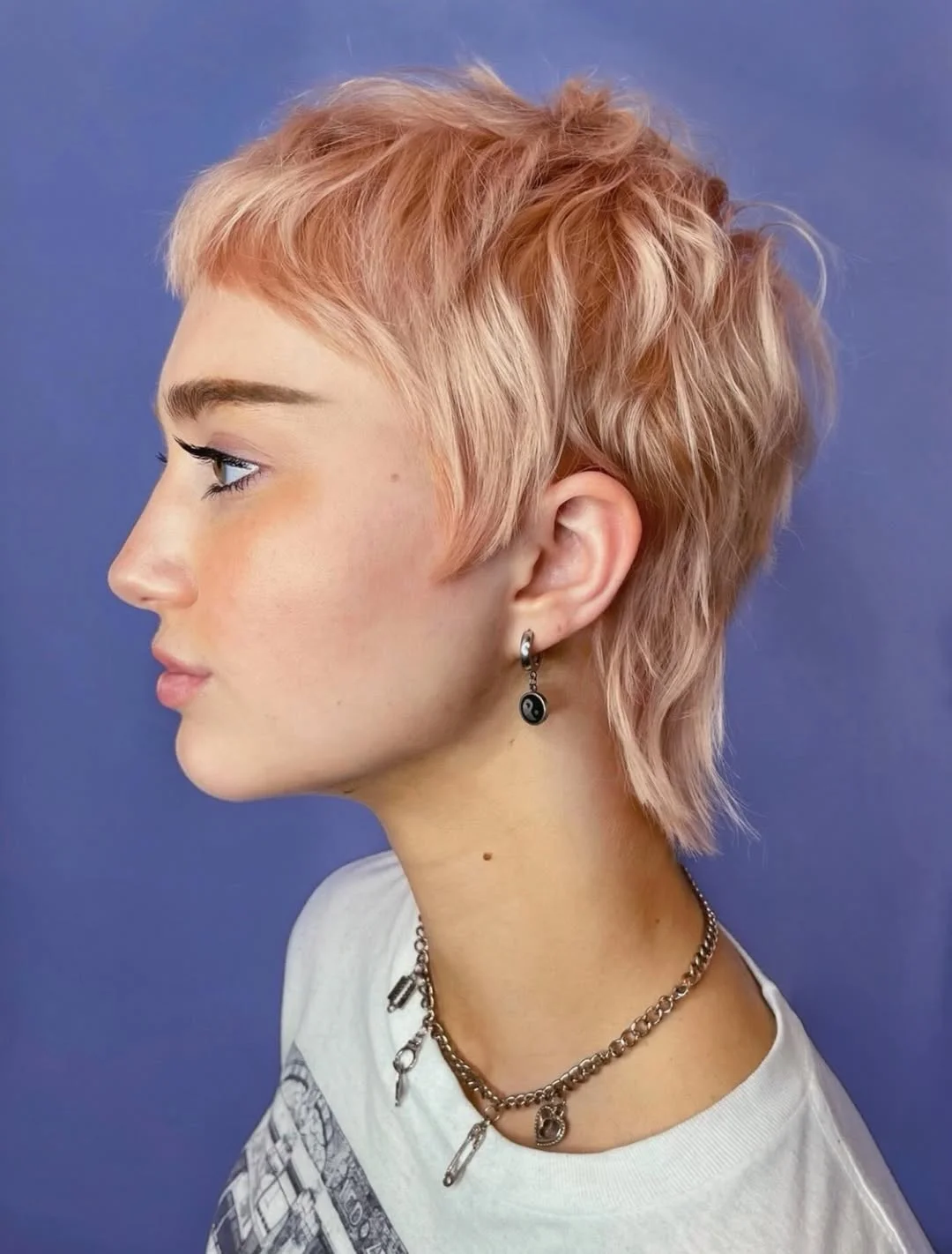 bold summer pixie haircuts 2026 Soft Peach Outgrown Pixie Mullet