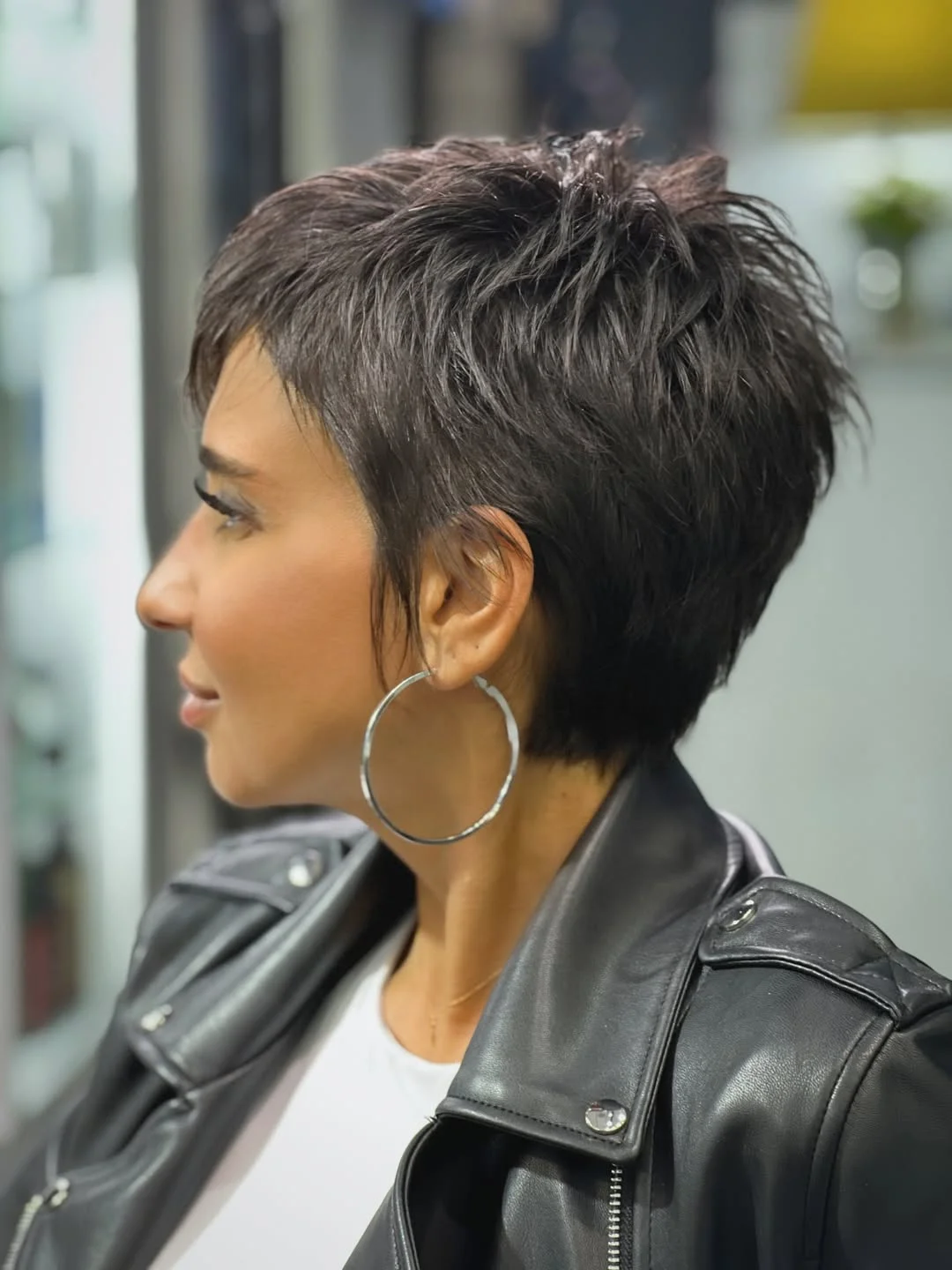 bold summer pixie haircuts 2026 Classic Brunette Pixie with Soft Bangs