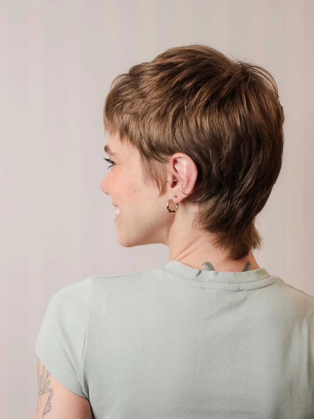 bold summer pixie haircuts 2026 Soft Brunette Pixie with Natural Flow